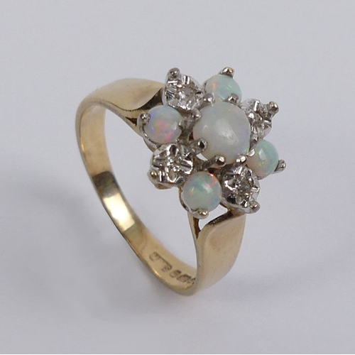 1 - 9ct gold opal and diamond ring, 3.3 grams, 12mm, size N.