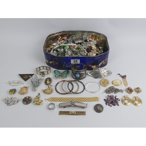 28 - A tin of mixed costume jewellery, including a cloisonne bangle and an enamelled butterfly.