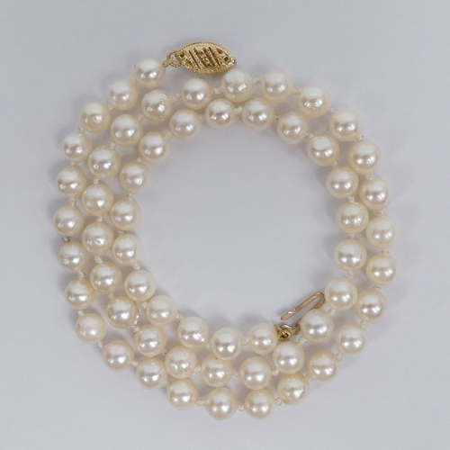 5 - Cultured pearl necklace with a 9ct gold clasp, 16.8 grams, pearls 6mm, length 44cm.