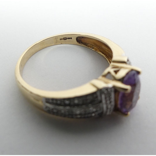 52 - 9ct gold amethyst and diamond ring, 3.1 grams, 8.1mm, size O.