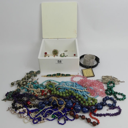 58 - A box of mixed costume jewellery including, a gold mounted stick pin and a malachite necklace.