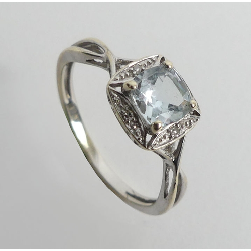 77 - 9ct gold aquamarine and diamond ring, 1.4 grams, 7.3mm, size J.