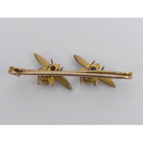 84 - 9ct gold sapphire and seed pearl bug brooch, 1.5 grams 32mm x 10mm.