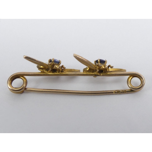 84 - 9ct gold sapphire and seed pearl bug brooch, 1.5 grams 32mm x 10mm.