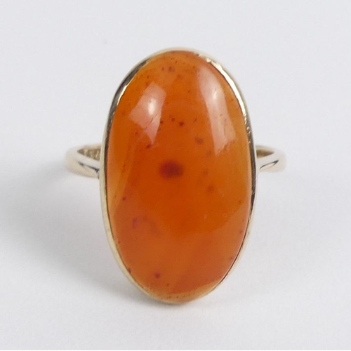 85 - 9ct gold carnelian ring, 3.7 grams, 20.8mm, size O 1/2.