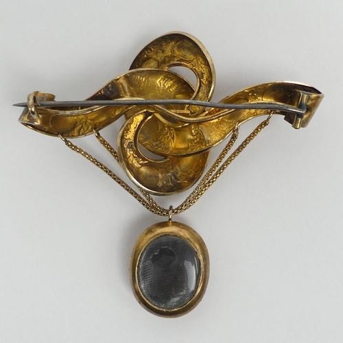 86 - Victorian 9ct gold (tested) garnet set brooch with a locket back, 14.9 grams, 66mm x 66mm.