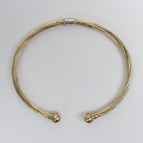 89 - 9ct gold on silver twisted torque bangle, 4.3 grams, 6mm.