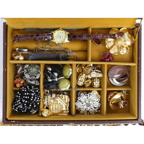 95 - A box of mixed costume jewellery, including silver pendants.