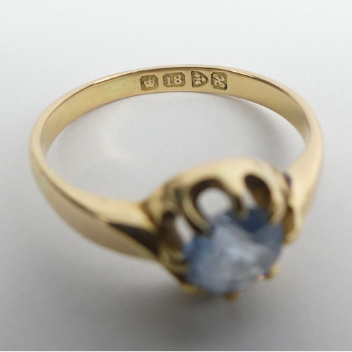 98 - 18ct gold, blue topaz single stone ring, Chester 1908, 3.1 grams, 8.7mm, size O.