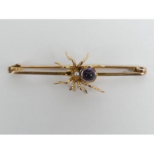 99 - 15ct gold amethyst and seed pearl spider brooch, 7.2 grams, 63mm x 18mm.