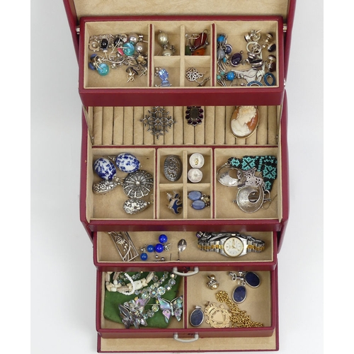 111 - A collection of jewellery including silver and abalone butterfly brooches and other items of silver.... 