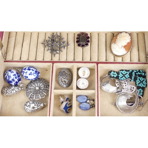 111 - A collection of jewellery including silver and abalone butterfly brooches and other items of silver.... 