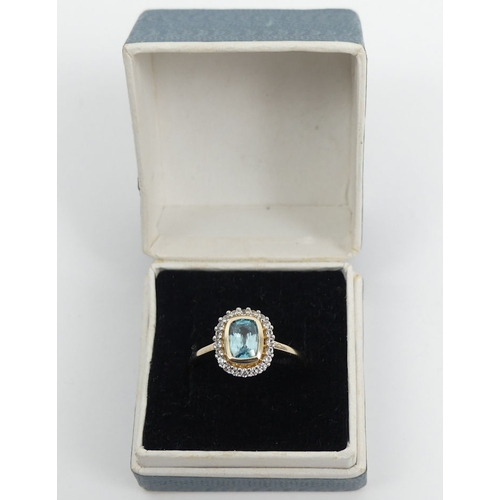 114 - 9ct gold blue and white topaz cluster ring, 24 grams, 11.5mm, size P 1/2.