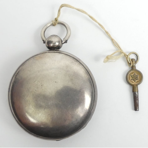 132 - Victorian silver open face pocket watch, London 1864, 72mm x 50mm.
Condition Report: In working orde... 