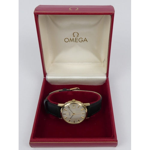 149C - Omega 9ct gold automatic date adjust watch in the original box, 35.5mm.
Condition Report: In working... 