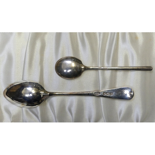 184 - Two cased sets of silver spoons, a silver and enamel set along with a cased set of silver handled kn... 