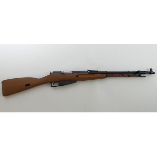 207 - Win Gun, Mosin Nagant CO2 bolt action rifle, .177 Cal. boxed with instructions and accessories. L102... 