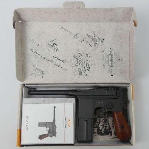 228 - Gletcher M7125 CO2 air gun, Cal. 177 boxed with instructions, 29cm. No licence is required to purcha... 