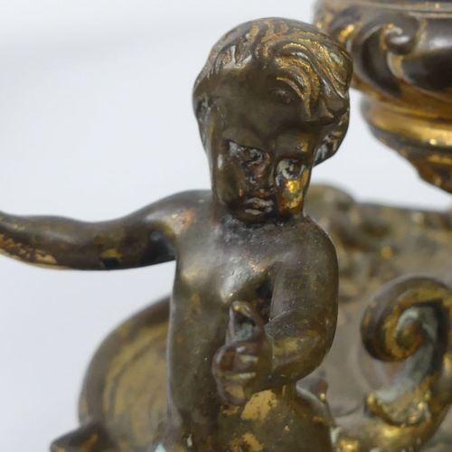 240 - A 19th century brass figural inkstand, 25cm x 12cm.