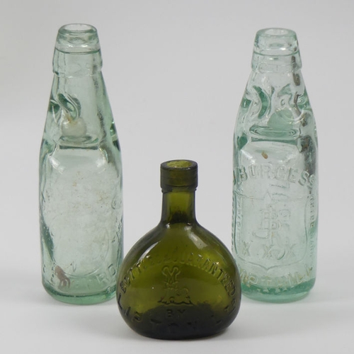 244 - Twelve pharmaceutical glass bottles and jars, including a Lipton example, 33cm.