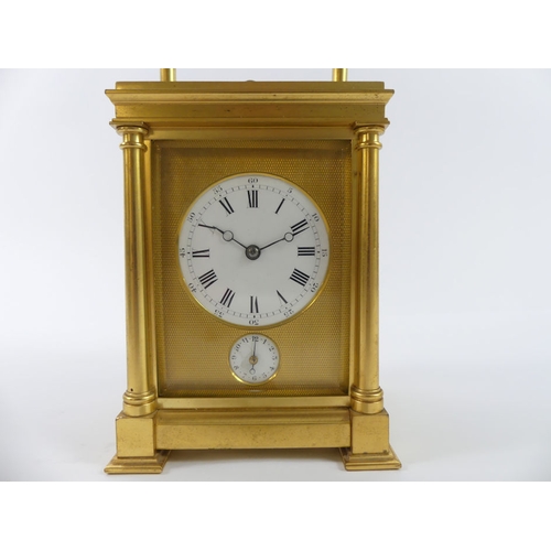 262 - A brass cased repeater and alarm carriage clock, 14cm x 10cm.