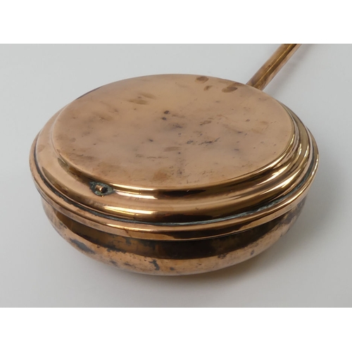 283 - Victorian copper warming pan, with rare copper handle, 132cm.