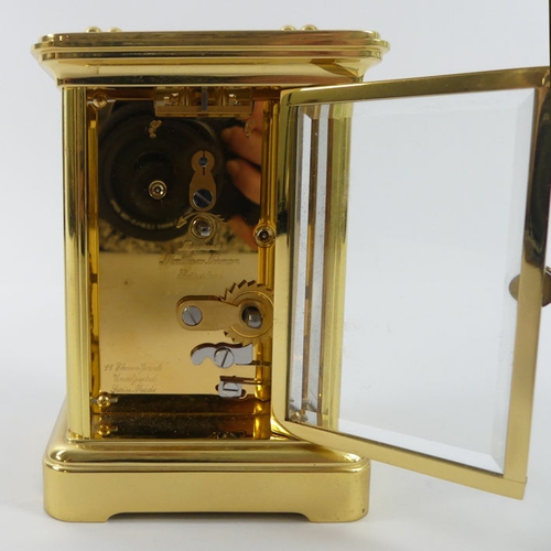 287 - A Matthew Norman brass carriage clock, 11cm x 7cm.