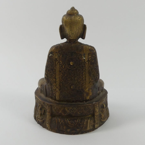 289 - A bronze figure of a Buddha, 18cm.