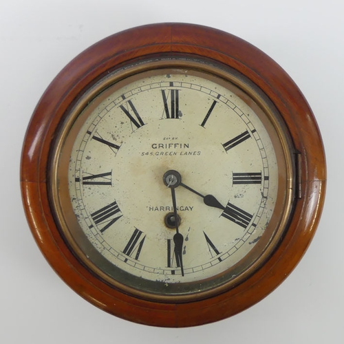 293 - A mahogany Post Office clock with an enamel dial, Griffin, 545 Green Lanes, with key and pendulum, 2... 