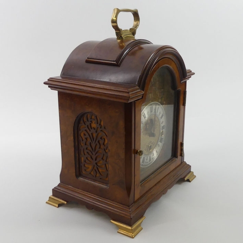 298 - A walnut cased bracket clock by Christian Huygens with a train chiming movement, 27cm x 23cm.