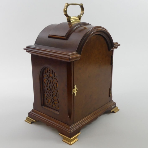 298 - A walnut cased bracket clock by Christian Huygens with a train chiming movement, 27cm x 23cm.