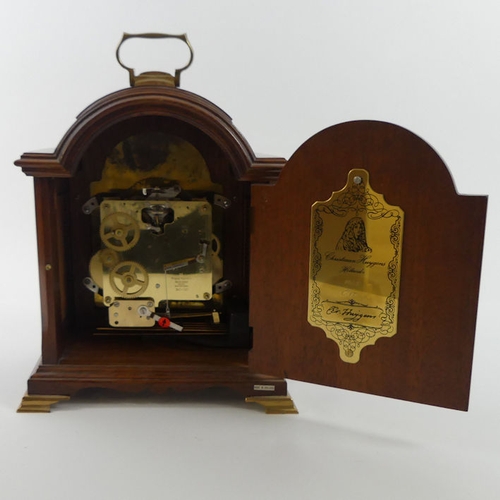 298 - A walnut cased bracket clock by Christian Huygens with a train chiming movement, 27cm x 23cm.