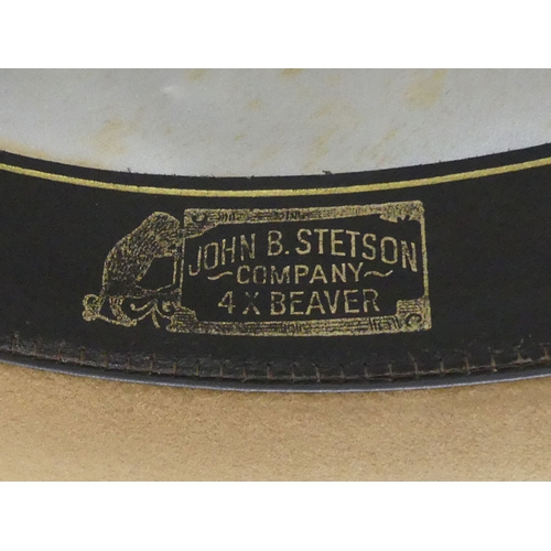 298A - A John B Stetson 6 7/8 size cowboy hat in the original box.