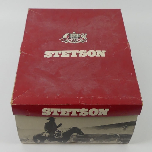 298A - A John B Stetson 6 7/8 size cowboy hat in the original box.