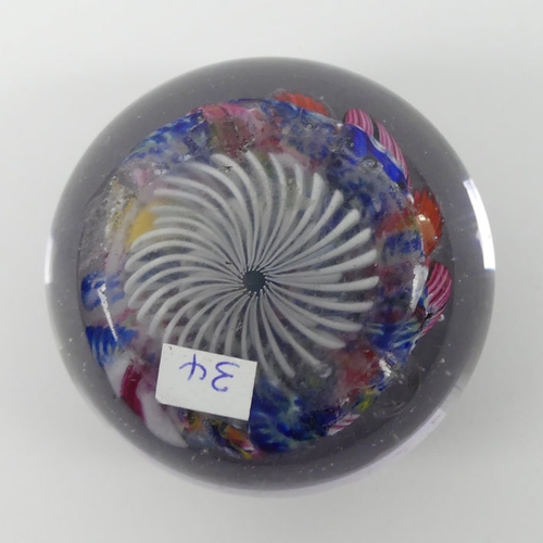 303 - A German Silesia glass paperweight. 5cm x 6cm