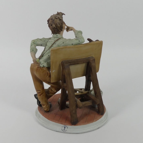 317 - Capodimonte porcelain figurine of an artist, 25cm.