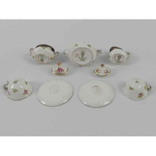 323 - Crown Staffordshire seven piece miniature china tea set.