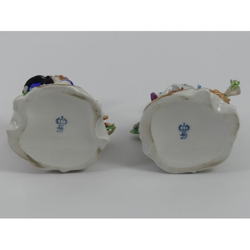 358 - A pair of Sitzendorf porcelain figurines depicting a courting couple, 13cm.