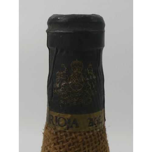 A bottle of Hessian bound aged Rioja.