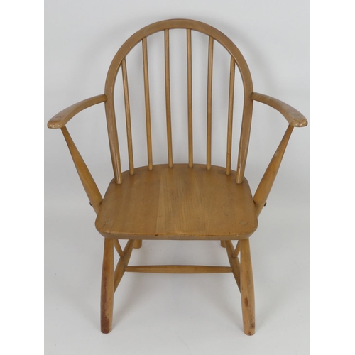 508 - An elm Ercol child's armchair. H70cm