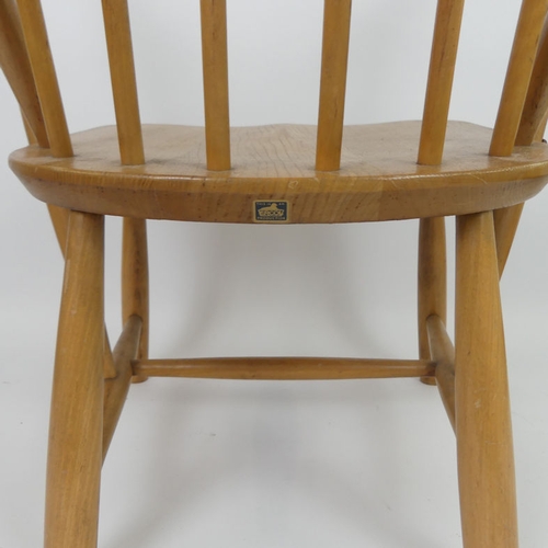 508 - An elm Ercol child's armchair. H70cm