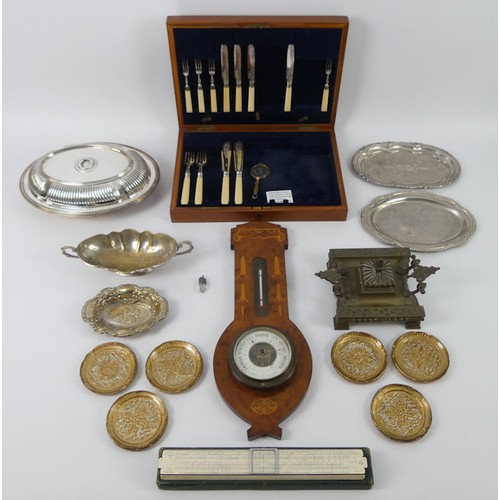 292 - A box of metalware, including inkstands and sweet dishes and a barometer.