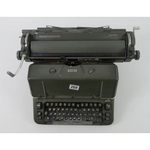 268 - A vintage Hermes typewriter, 26cm x 37cm.