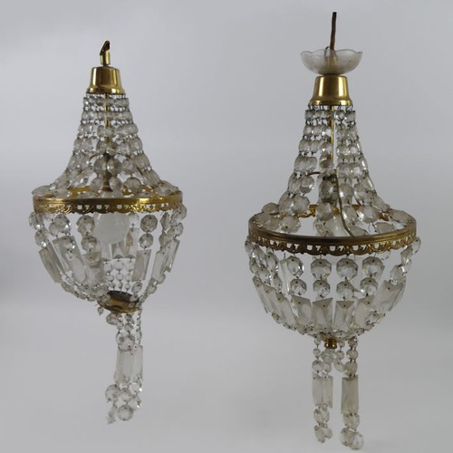 286 - A pair of brass and cut glass chandeliers, 60cm.