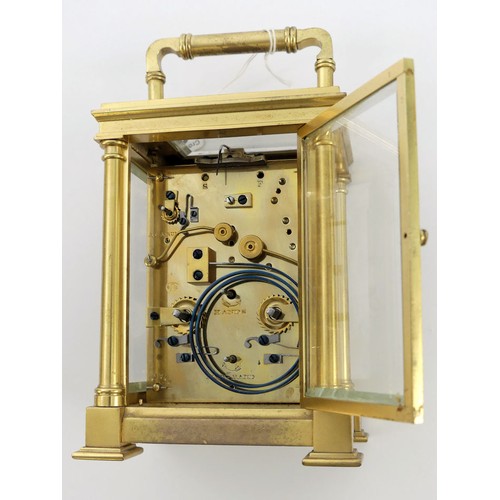 262 - A brass cased repeater and alarm carriage clock, 14cm x 10cm.