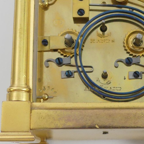 262 - A brass cased repeater and alarm carriage clock, 14cm x 10cm.