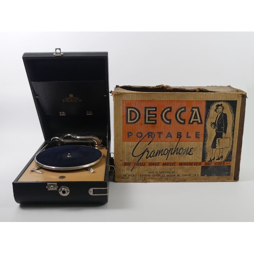 269 - The Decca 10 portable wind up gramophone in original packaging box, 16cm x 44cm. Condition: Good wor... 