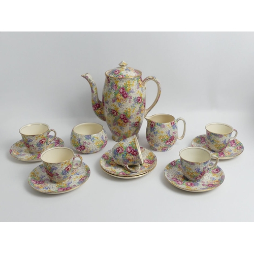 358 - Royal Winton 'Spring' chintz coffee pot, five cups, six saucers, sugar bowl and cream jug. H22cm