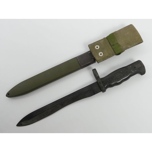 187 - A WWII Spanish Toledo in rifle bayonet and scabbard, blade 22cm.