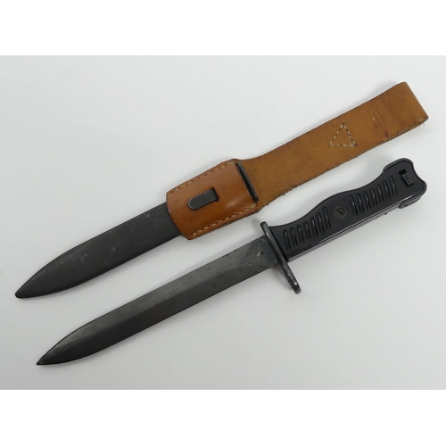 249 - A vintage Yugoslavian M56 Sub-Machine gun bayonet with scabbard, blade 17cm.